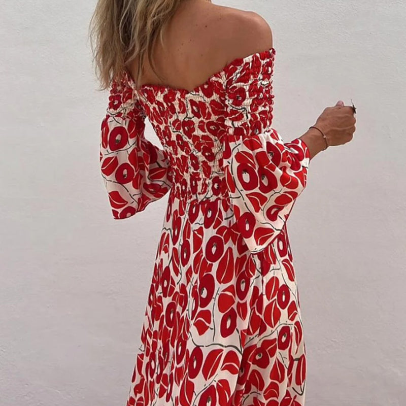 Langes Kleid mit Blumenmuster, offenen Schultern und ausgestellten Ärmeln